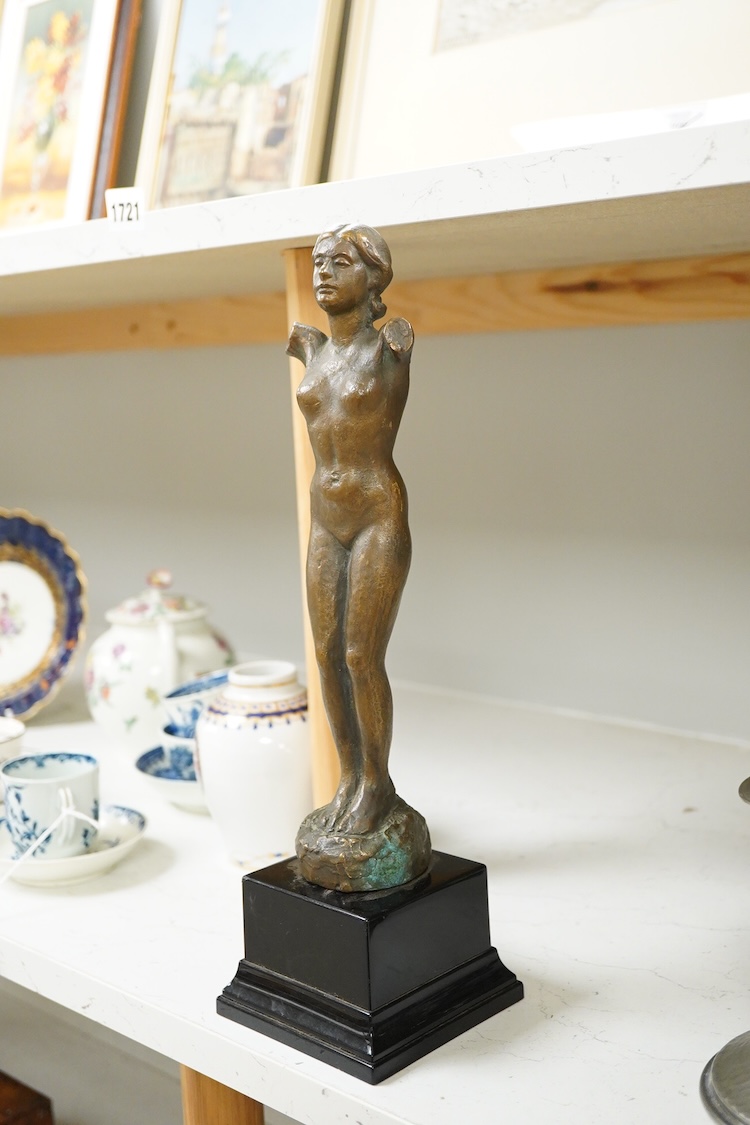 R. Schmitz, a German bronze study of a lady, raised on stepped base, 35cm high